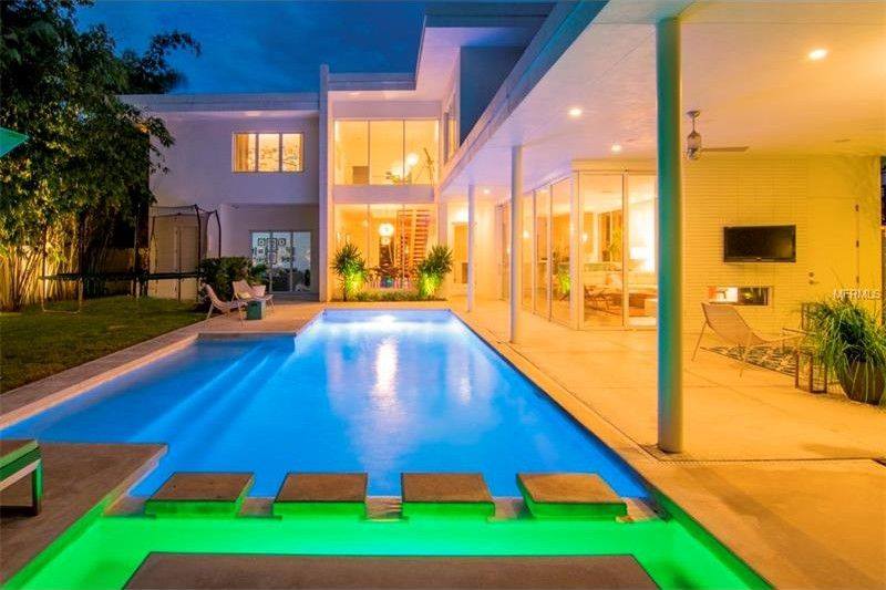 Mid Century Modern: pool and patio, lit