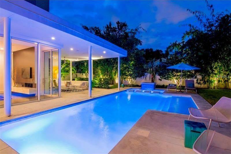 Mid Century Modern: pool and patio, evening